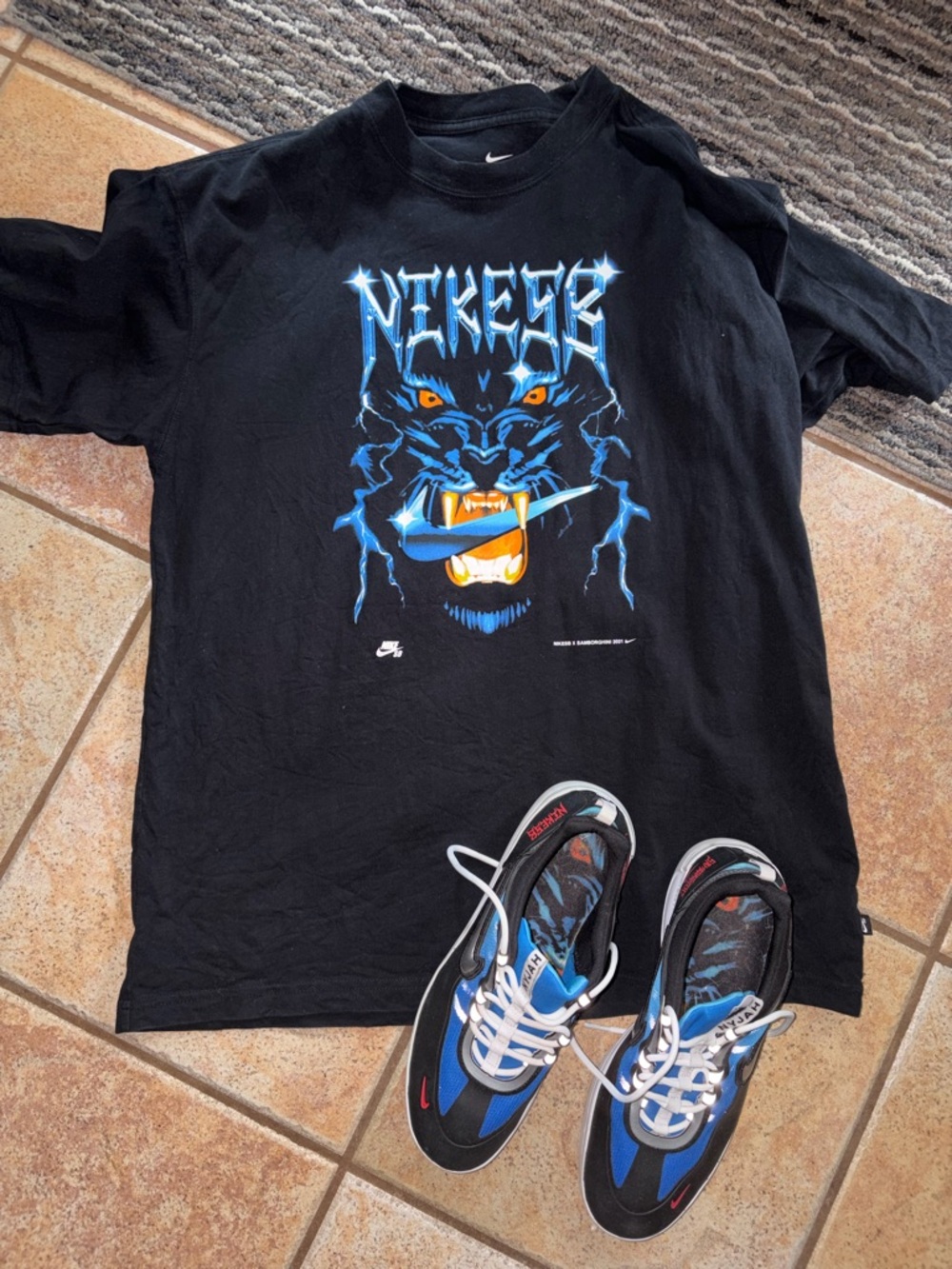 Nike Black Graphic Tee with Blue Panther Design